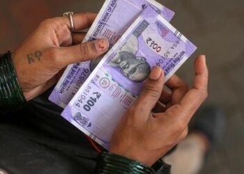 Rupee settles at new closing low of 83.57 in opposition to greenback forward of FOMC meet | Finance Information