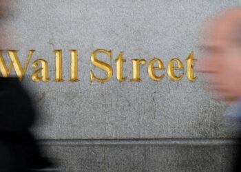 Shares reel on ‘R-word’ return, Nikkei dives 12%