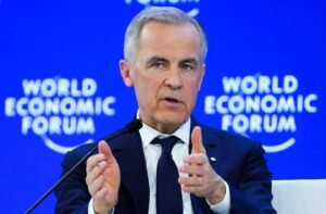 Carney says Canada will respect USMCA commitments after Trump threatens 100% tariffs
