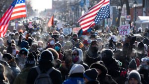 Protesters demand end to immigration crackdown after Minneapolis shooting