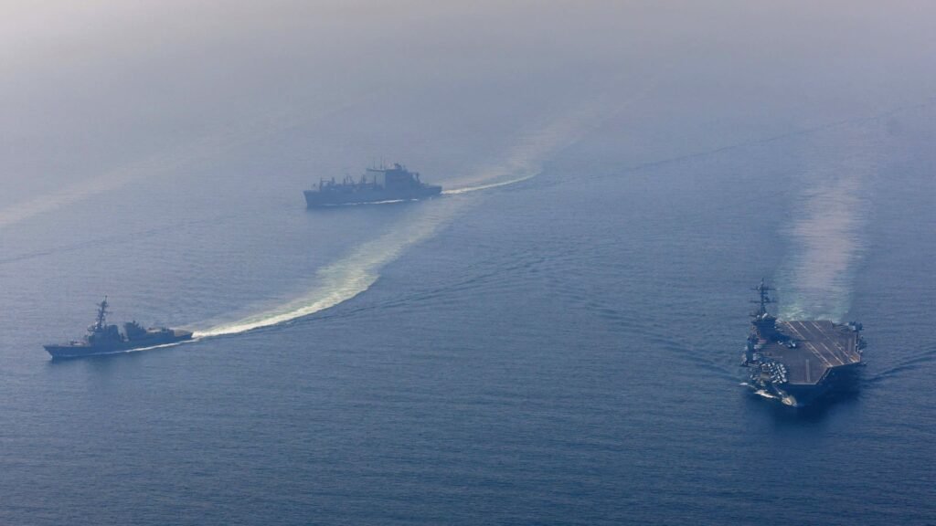 US warns Iran to make a deal as it steps up military deployments