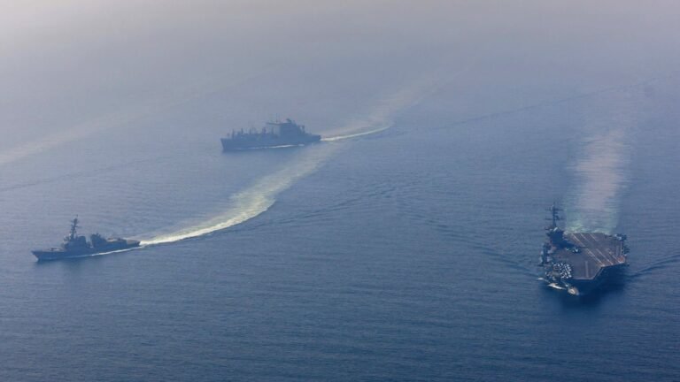 US warns Iran to make a deal as it steps up military deployments