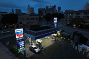 Chevron exec says that with high gas prices, Americans should drive less