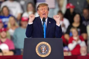 Trump's economic boom reaches deep-blue states despite political hostility